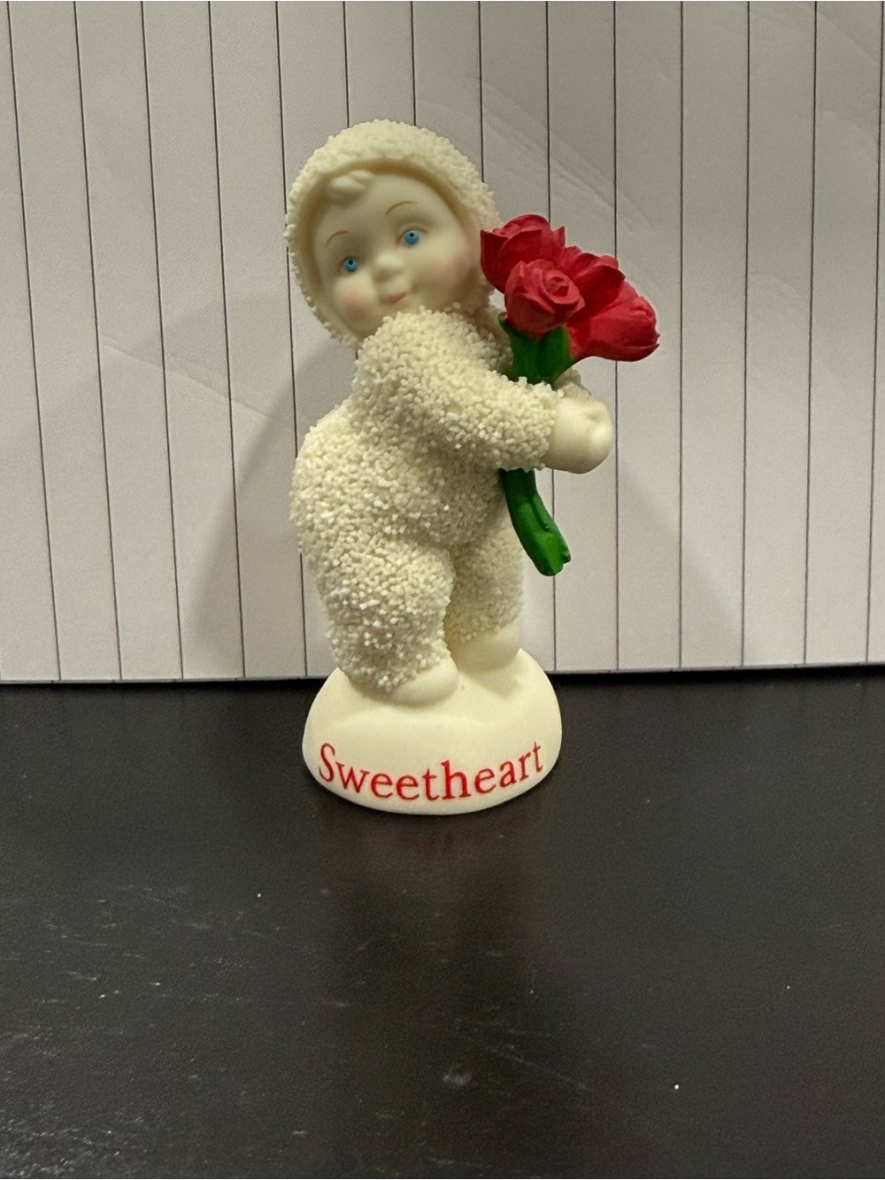 Dept 56 Snowbaby Sweetheart” ceramic figure holding roses
